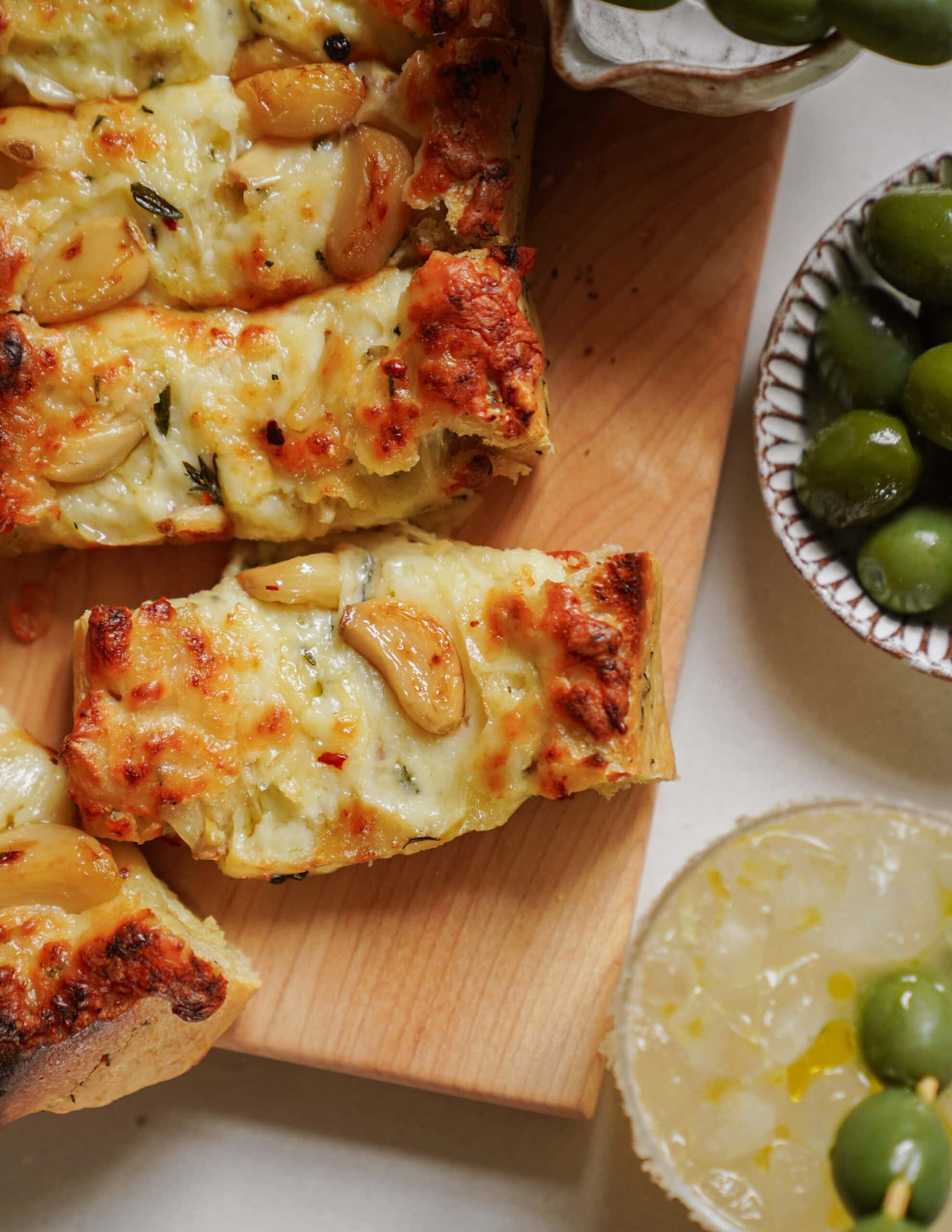 The Ultimate Pairing: Garlic Confit Cheese Toast & Olive Margarita